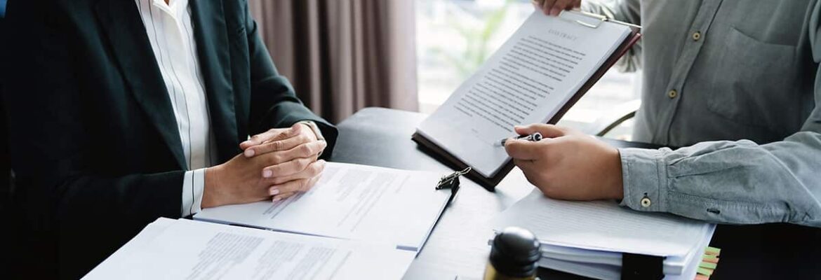 Legal documents signing on desk